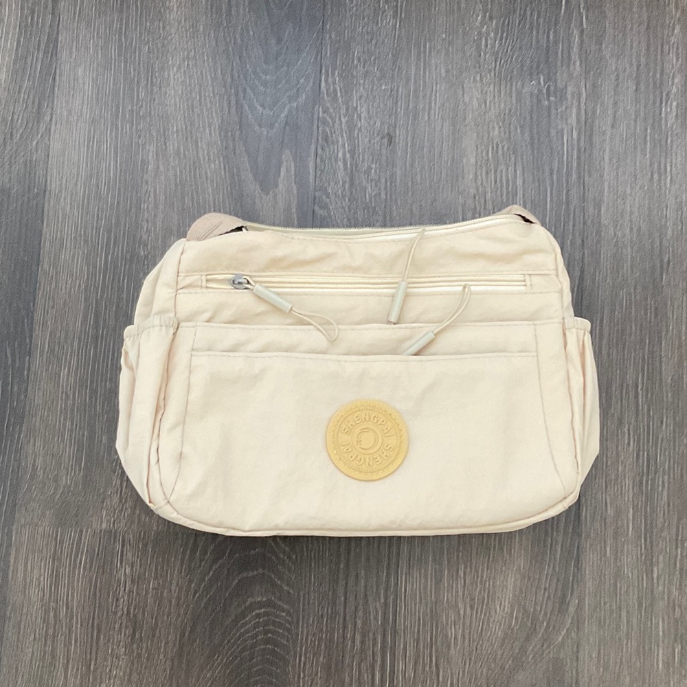 cute crossbody medium bag with a lot of compartments